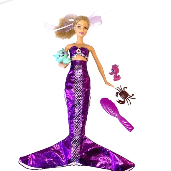 Barbie doll wearing mermaid fin and bikini top - Picture 4 of 8